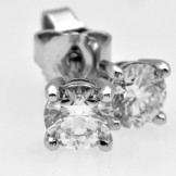 SOLD..One carat total weight diamond studs